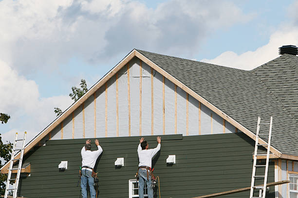 Professional Siding Replacement technician working in Barton, OH